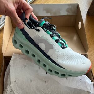 On Running White and Teal Sneakers